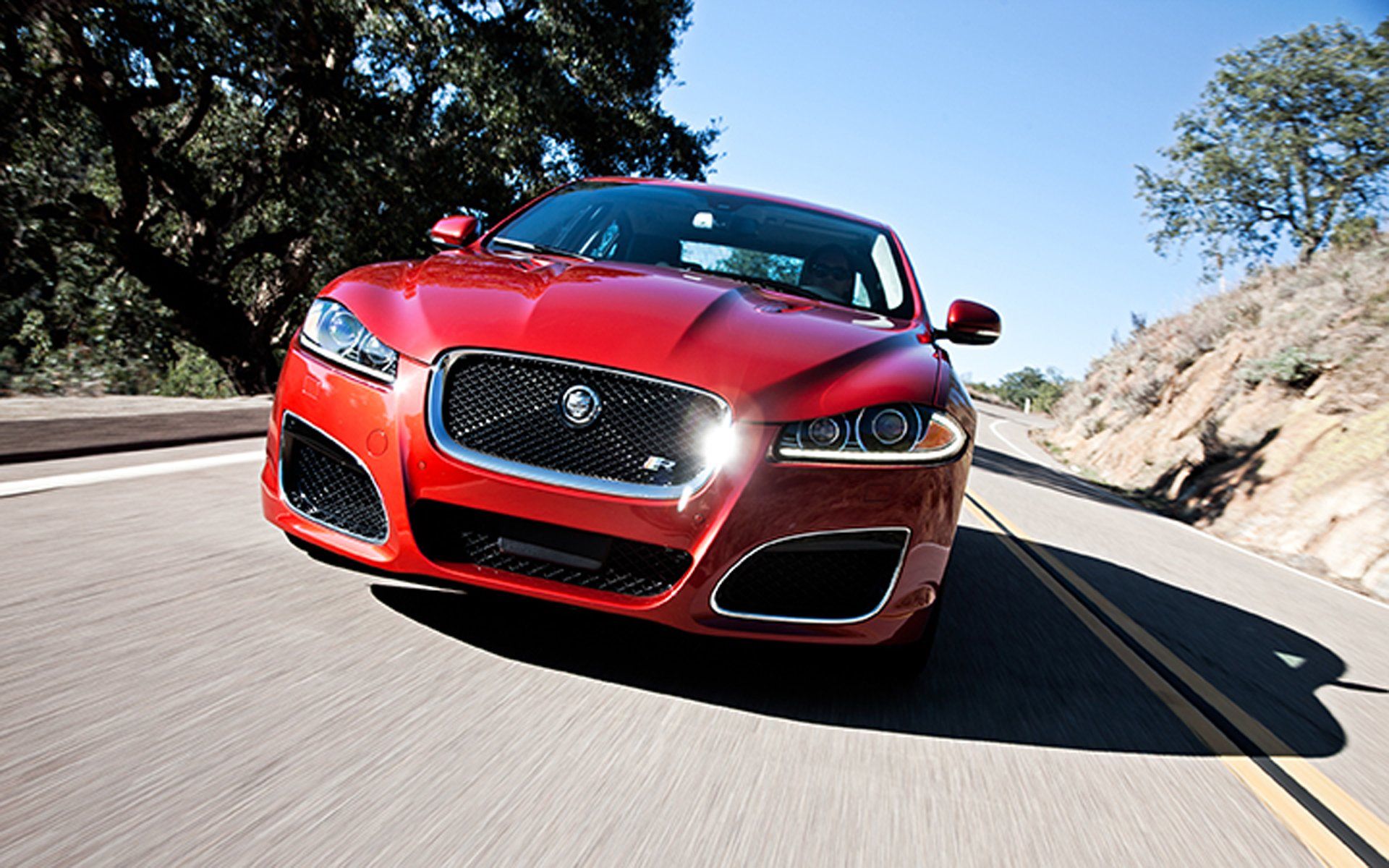 Ягуар машина страна. Ягуар х1. Ягуар XF 2012 красный. Jaguar XF красный 2020. Jaguar XFR 2022.